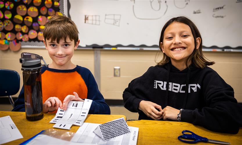 Students make paper houses